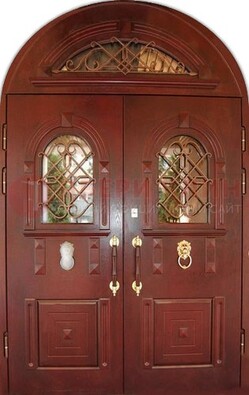 Стальная арочная дверь со стеклом и ковкой ДА-30 в дом из кирпича в Йошкар-Оле
