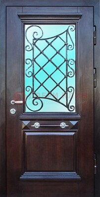 Коттеджная металлическая дверь со стеклом и ковкой ДСК-57 в Санкт-Петербурге