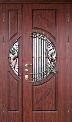 Железная дверь с виноритом и стеклом с ковкой ДВТ-170 в Люберцах